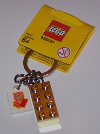 2 x 4 Brick - Chrome Gold Key Chain with Lego 50 Year Anniversary Logo Tile, Modified 3 x 2 Curved with Hole (852445)