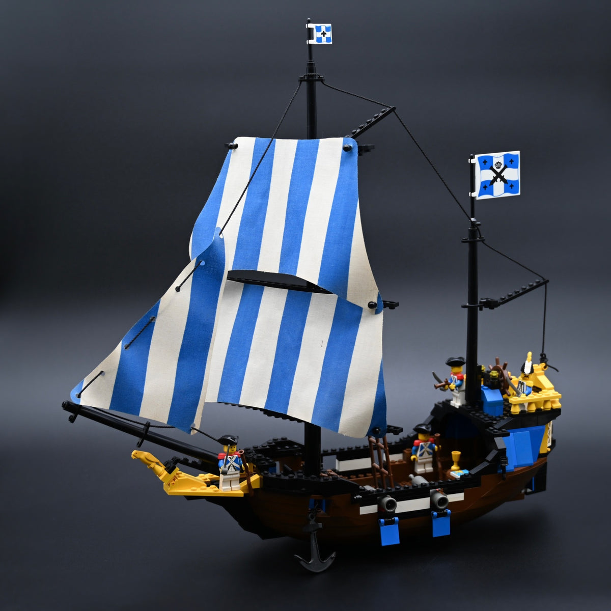 LEGO Caribbean Clipper ship with blue and white striped sails and Imperial Soldier minifigures